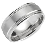 A wedding band in white gold with a brushed center and milgrain detailing. 