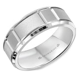 A sandblasted white wedding band with notch detailing and beveled edges.