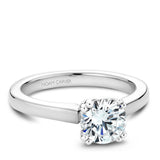 A Noam Carver white white gold engagement ring with a round centerpiece.