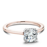 A Noam Carver rose and white gold engagement ring with a round centerpiece and 8 diamonds.