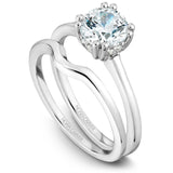 A Noam Carver white gold engagement ring with a round centerpiece and 8 diamonds.