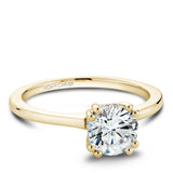 A Noam Carver yellow gold engagement ring with a round centerpiece and 8 diamonds.