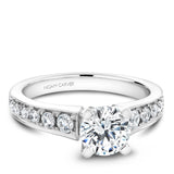 A Noam Carver white gold engagement ring with 14 diamonds.
