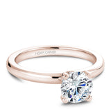 A Noam Carver rose gold engagement ring with 8 diamonds.