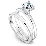 A Noam Carver white gold engagement ring with 8 diamonds.