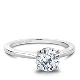 A Noam Carver white gold engagement ring with a round centerpiece.