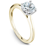 A Noam Carver yellow and white gold engagement ring with a round centerpiece.