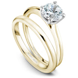 A Noam Carver yellow and white gold engagement ring with a round centerpiece.