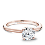 A Noam Carver rose gold engagement ring with a round centerpiece.