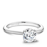 A Noam Carver white gold engagement ring with a round centerpiece.