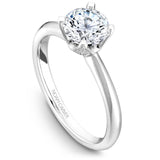 A Noam Carver white gold engagement ring with a round centerpiece and 32 diamonds.