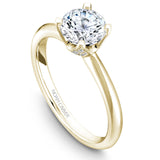 A Noam Carver yellow gold engagement ring with a round centerpiece and 32 diamonds.