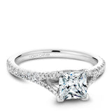 A Noam Carver white gold engagement ring with a princess cut centerpiece and 36 diamonds.