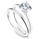 A Noam Carver white gold engagement ring with a round centerpiece.