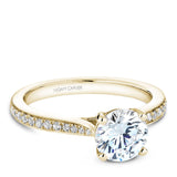 A Noam Carver yellow gold engagement ring with 26 diamonds.