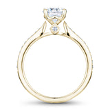 A Noam Carver yellow gold engagement ring with 26 diamonds.