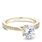 A Noam Carver yellow gold engagement ring with 26 diamonds.