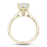 A Noam Carver yellow gold engagement ring with 26 diamonds.