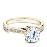 A Noam Carver yellow gold engagement ring with 26 diamonds.