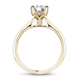 A Noam Carver yellow gold engagement ring with 26 diamonds.