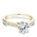 A Noam Carver yellow gold engagement ring with 22 diamonds.