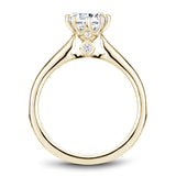 A Noam Carver yellow gold engagement ring with 22 diamonds.