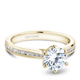 A Noam Carver yellow gold engagement ring with 22 diamonds.