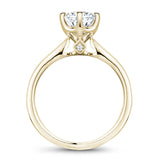 A Noam Carver yellow gold engagement ring with 22 diamonds.