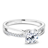 A Noam Carver white gold engagement ring with 18 diamonds.