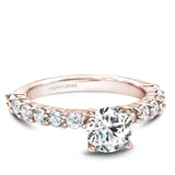A Noam Carver rose gold engagement ring with 12 diamonds.