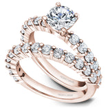 A Noam Carver rose gold engagement ring with 12 diamonds.
