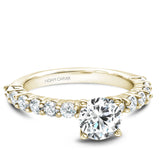 A Noam Carver yellow gold engagement ring with 12 diamonds.