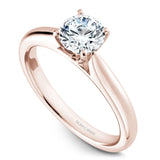 A Noam Carver rose gold engagement ring with a round centerpiece.