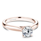 A Noam Carver rose gold engagement ring with a round centerpiece.