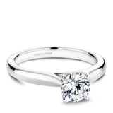 A Noam Carver white gold engagement ring with a round centerpiece.