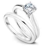 A Noam Carver white gold engagement ring with a round centerpiece.