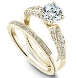 A Noam Carver yellow gold engagement ring with 46 diamonds.