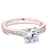 A Noam Carver rose gold engagement ring with 16 diamonds.