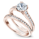 A Noam Carver rose gold engagement ring with 16 diamonds.