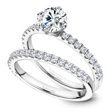 A Noam Carver white gold engagement ring with 18 diamonds.