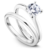 A Noam Carver white gold engagement ring with a round centerpiece.