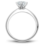 A Noam Carver white gold engagement ring with a round centerpiece.