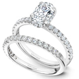 A Noam Carver white gold engagement ring with an oval centerpiece and 30 diamonds.
