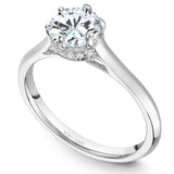 A Noam Carver white gold engagement ring with 12 diamonds.