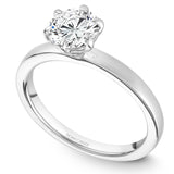 A Noam Carver white gold engagement ring with a round centerpiece.