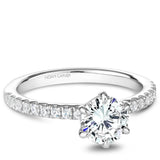 A Noam Carver white gold engagement ring with 18 diamonds.
