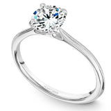 A Noam Carver white gold engagement ring with a round centerpiece.