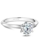 A Noam Carver white gold engagement ring with a round centerpiece.