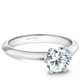 A Noam Carver white gold engagement ring with a round centerpiece.