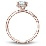 A Noam Carver rose gold engagement ring with 16 diamonds.